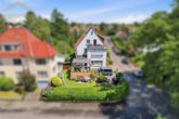 Außenansicht (3) - Attraktives Mehrfamilienhaus mit 3 Wohneinheiten & 2 Garagen in Langenhagen! Mein Haus = Mein Makler