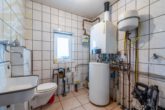 Gäste WC und HWR im Aussenbereich - Doppelhaushälfte mit Pool und Kaminofen in Ummern!