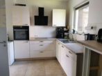 Küche - Neuwertige 2-Zimmer Doppelhaushälfte mit großer Terrasse & Kaminofen! Meine Immobilie – mein Partner