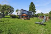 Garten - Modernisiertes Zweifamilienhaus mit großem Garten, Sauna und Garagen! Meine Immobilie=Mein Partner!
