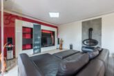 Wohnzimmer - Modernes Einfamilienhaus mit Sauna, Kaminofen und Garten in Kästorf! Meine Immobilie=Mein Partner!