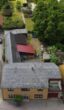 Luftbild - Einfamilienhaus mit alter Stallung und großem Grundstück!