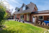 Gartenansicht mit Terrasse - Provisionsfrei für den Käufer! Einfamilienhaus in ruhiger Lage in Eischott bei Wolfsburg mit Garage!